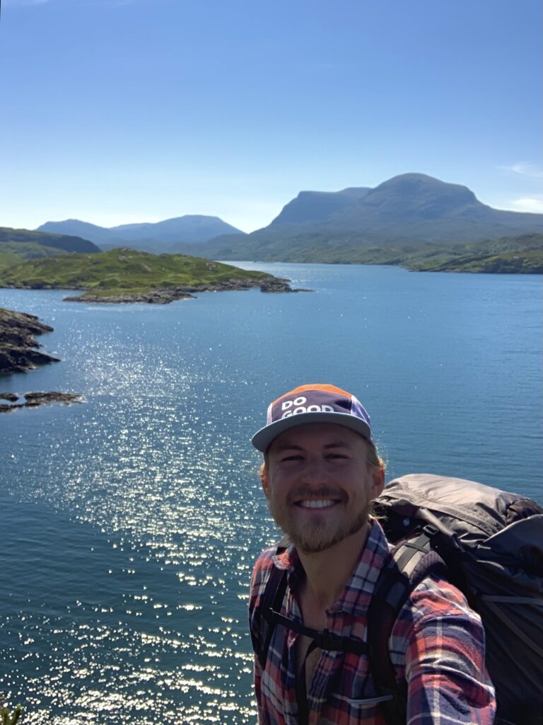 Grinning at the beautiful Assynt coastline, NW Scotland.